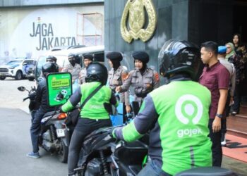 Polda Metro Jaya Bagi-bagi Bansos ke Driver Ojol, Dana Bansos Jadi Sorotan Ketua JMP