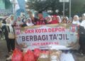 Peringati HUT ke 18 Tahun DKR Berbagi Takjil untuk Pengguna Jalan